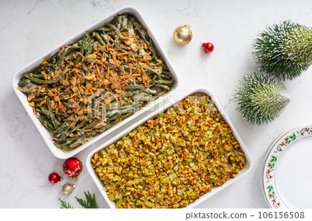 Christmas dinner side dishes including greean beans casserole and stuffing Christmas dinner side dishes including greean beans casserole and stuffing 106156508