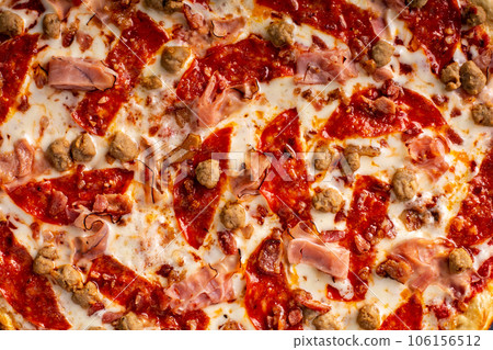 Meat lover pizza with pepperoni, ham and sausage 106156512