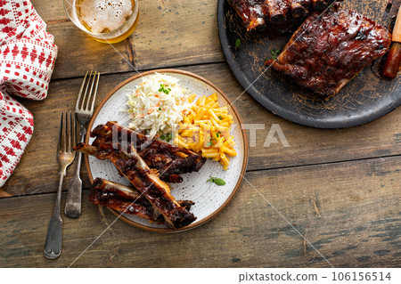 Barbeque meal with ribs and side dishes Barbeque meal with ribs and side dishes 106156514