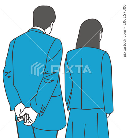 Back view of a woman in uniform and a man in a suit 106157300
