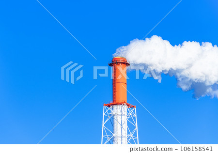 A clear sky and a chimney that raises white smoke 106158541