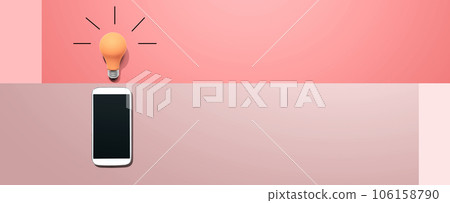 Smartphone with a yellow light bulb 106158790