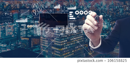 Marketing concept with businessman in city at night 106158825