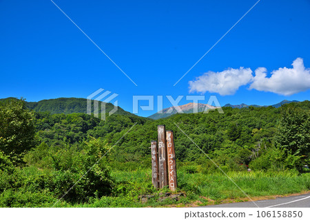 《Nagano Prefecture》Mt. Ontake in summer looking up from the entrance of the Mitake Ropeway on Gifu Prefectural Road No. 20 in Mitake, Kiso-cho, Kiso-gun 106158850