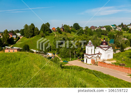 View from the Maloyaroslavets settlement to the surrounding rural landscape with a chapel and houses, Maloyaroslavets, Russia View from the Maloyaroslavets settlement to the surrounding rural landscape with a chapel and houses, Maloyaroslavets, Russia 106159722