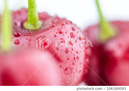 Close up of fresh wet cherry on table Close up of fresh wet cherry on table 106160093