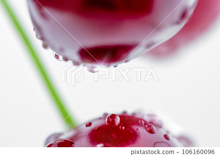 Fresh ripe red cherries with water drops close-up. Fresh ripe red cherries with water drops close-up. 106160096
