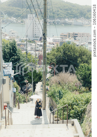 Young woman traveling alone in Onomichi Young woman traveling alone in Onomichi 106160418