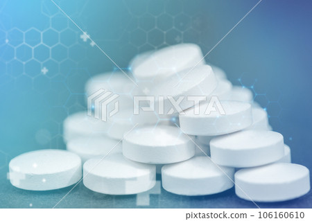 Abstract pills on dark background. Particles are connected in a geometric silhouette. Electronic medical record. 106160610