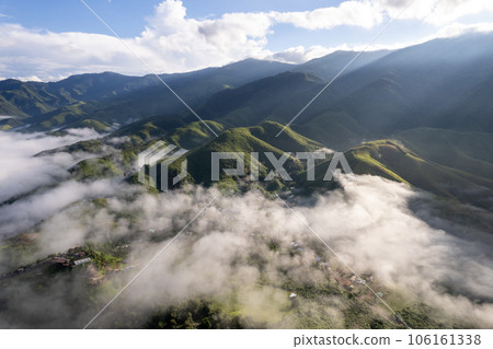 Top view Landscape of Morning Mist with Mountain Layer at north of Thailand. mountain ridge and clouds in rural jungle bush forest 106161338