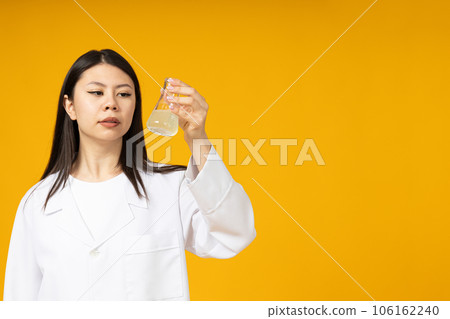 Asian girl doctor in a white coat Asian girl doctor in a white coat 106162240