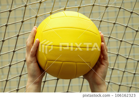 Male hands holding volleyball ball, close up Male hands holding volleyball ball, close up 106162323