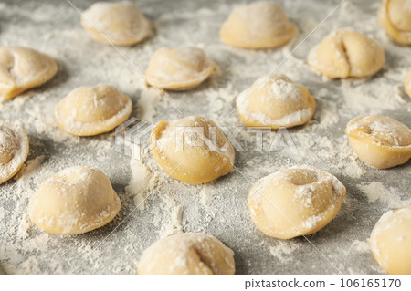 Cooking home food concept with raw dumplings Cooking home food concept with raw dumplings 106165170