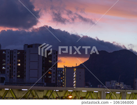 sunset of hong kong and mountain range of lion rock 106166800