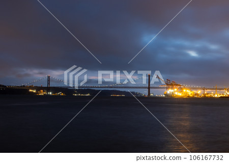 Tagus river and 25th of april bridge - night landscape 106167732