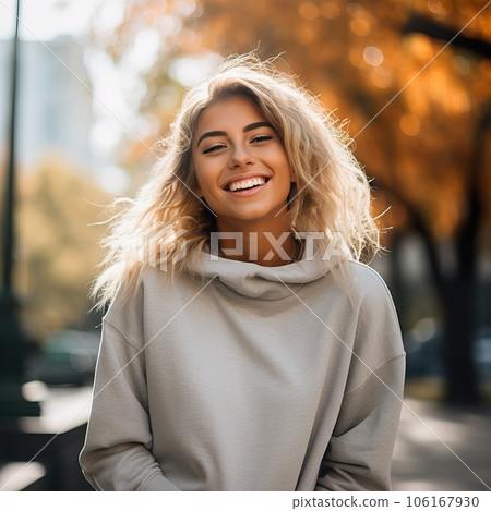 Beautiful young lady dressed in gray sweater, commercial sweatshirt mock-up, smiling blonde woman standing in the street Beautiful young lady dressed in gray sweater, commercial sweatshirt mock-up, smiling blonde woman standing in the street 106167930