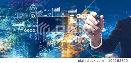 Digital Transformation concept with businessman in a bokeh neon light trails city background Digital Transformation concept with businessman in a bokeh neon light trails city background 106168833