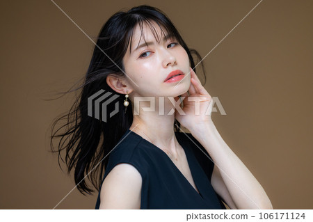 A woman in a black dress A woman in a black dress 106171124