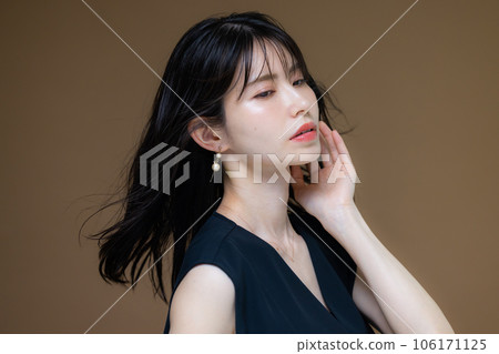 A woman in a black dress A woman in a black dress 106171125