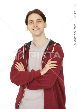 Happy young man in red hoody standing with crossed arms on white background 106171135