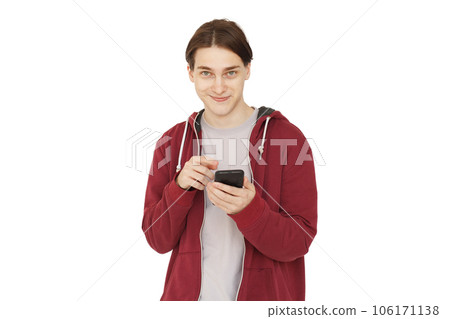Happy guy smiling while using mobile phone isolated over white background 106171138