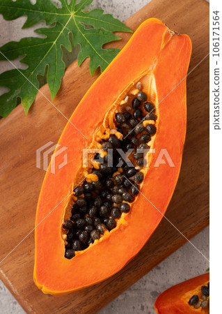 papaya fruit summer top view sliced papaya fruit 106171564