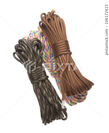 Pack group Climbing Rope roll fly in air. Strong safety climbing rope for sport mountain hobby, need safety gear to lock hold weight of climber rope. White background isolated 106172615