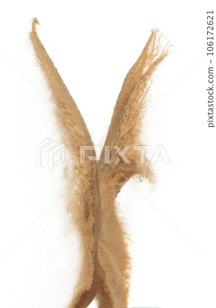 Sand flying explosion, Golden grain wave explode. Abstract cloud fly. Yellow colored sand splash throwing in Air. White background Isolated high speed shutter, throwing freeze stop motion Sand flying explosion, Golden grain wave explode. Abstract cloud fly. Yellow colored sand splash throwing in Air. White background Isolated high speed shutter, throwing freeze stop motion 106172621
