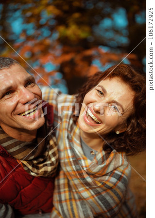cheerful modern family in park having fun time 106172925