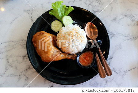Flat lay of Chicken's thigh braised in soy sauce set. 106173812