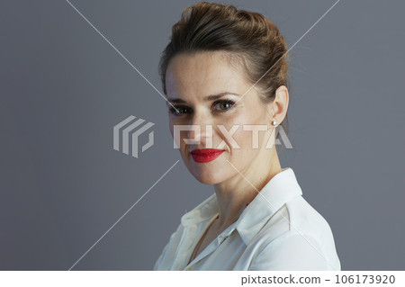 stylish woman worker isolated on gray stylish woman worker isolated on gray 106173920