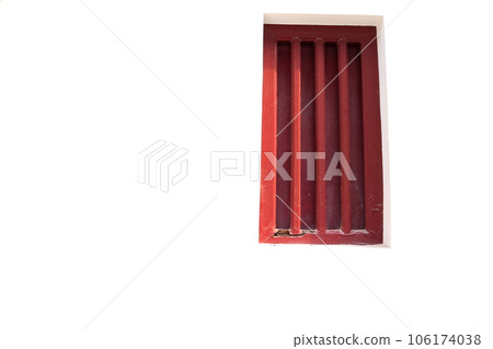 A red wood window on white wall. A red wood window on white wall. 106174038
