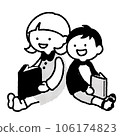 little kid siblings reading a book 106174823