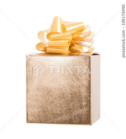 Big gift box decorated with golden paper and bow Big gift box decorated with golden paper and bow 106178498