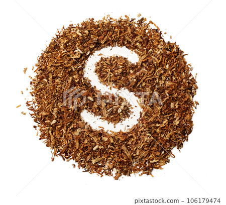 Letter S made of cigarettes dried smoking tobacco on white background 106179474