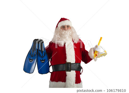 santa claus vacations by the sea with fin and snokeling mask 106179810