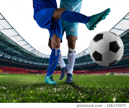 Soccer  player play with soccerball during a football match 106179975