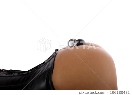 woman in bdsm lingerie with a sexy toy 106180481