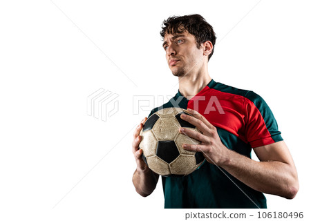 Football player holds the ball and he is ready to play with soccer 106180496