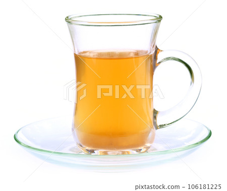 Tea liquor on a transparent cup Tea liquor on a transparent cup 106181225