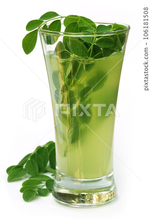 Ayurvedic Juice made from moringa leaves 106181508
