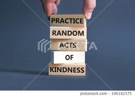 Practice random kind of kindness symbol. Concept words Practice random kind of kindness on wooden block. Beautiful grey background. Businessman hand. Business practice kindness concept. Copy space. Practice random kind of kindness symbol. Concept words Practice random kind of kindness on wooden block. Beautiful grey background. Businessman hand. Business practice kindness concept. Copy space. 106182575