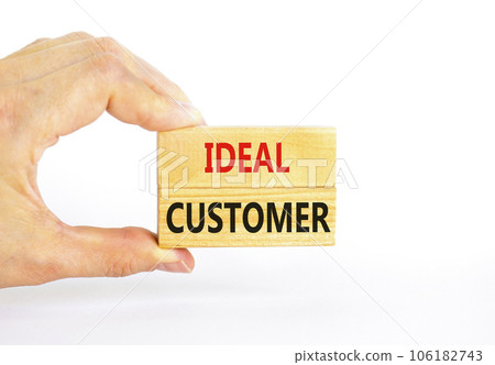 Ideal customer symbol. Concept words Ideal customer on beautiful wooden blocks. Beautiful white table white background. Businessman hand. Business ideal customer concept. Copy space. Ideal customer symbol. Concept words Ideal customer on beautiful wooden blocks. Beautiful white table white background. Businessman hand. Business ideal customer concept. Copy space. 106182743