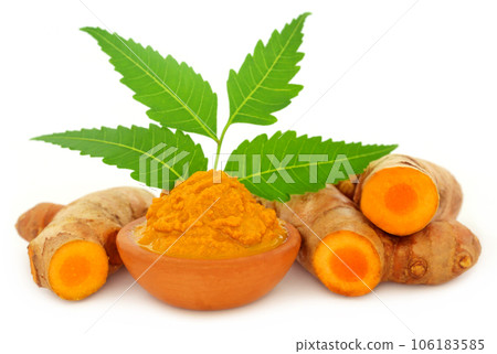 Medicinal turmeric paste with neem leaves Medicinal turmeric paste with neem leaves 106183585