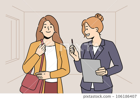Woman real estate agent or realtor shows apartment to girl to client and offers conclude contract. 106186407