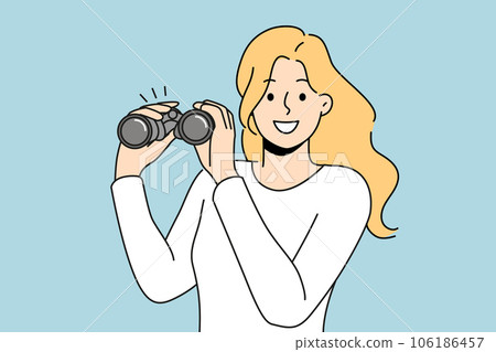Woman with binoculars smiles and looks into camera, showing eagerness to learn new facts 106186457