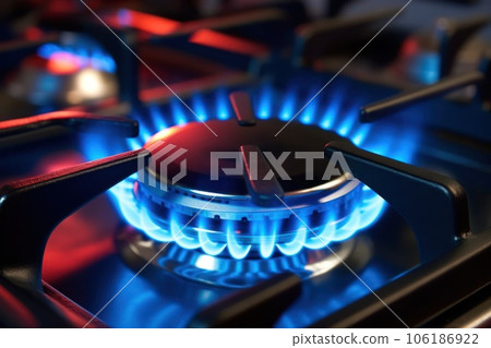 gas burner for gas stove with blue flame close-up 106186922