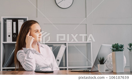 Pensive freelancer. Job considering. Thoughtful confident woman working on computer thinking about new project sitting at workplace. 106187639