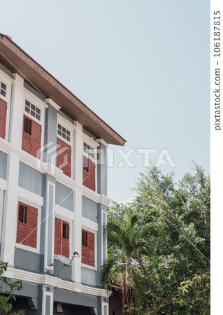 Georgetown street traditional malaysian house and green tree in Penang, Malaysia 106187815