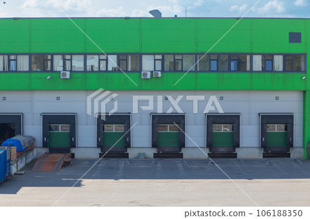 Row of loading docks with shutter doors. Row of loading docks with shutter doors. 106188350
